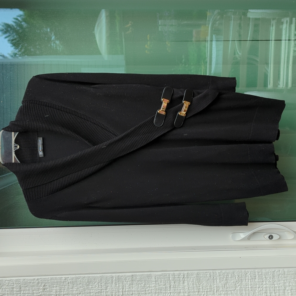 Black cowl neck sweater with gold buckles